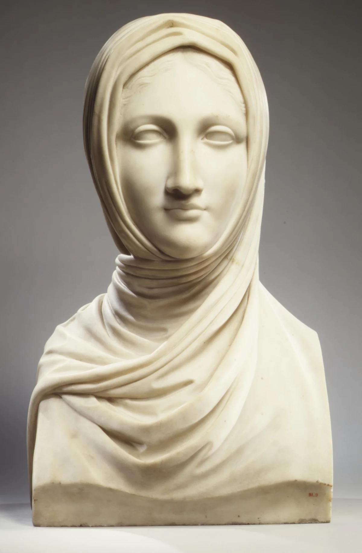 Antonio Canova's marble bust The Vestal: a young woman, veiled, eyes lowered, perfectly still.